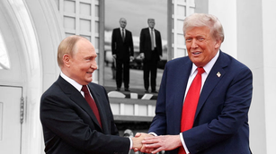 Trump Places Photo with Putin in White House Next to Granddaughter Picture