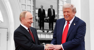 Trump Places Photo with Putin in White House Next to Granddaughter Picture