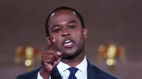Daniel Cameron stands on stage in an empty Mellon Auditorium while addressing the Republican National Convention in Washington, on Aug. 25, 2020.
