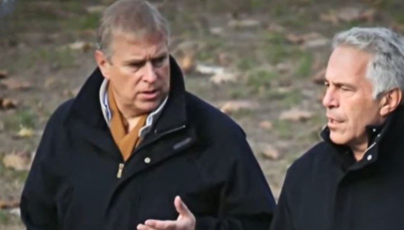 Andrew walks and talks with his best friend, Jeffrey Epstein.