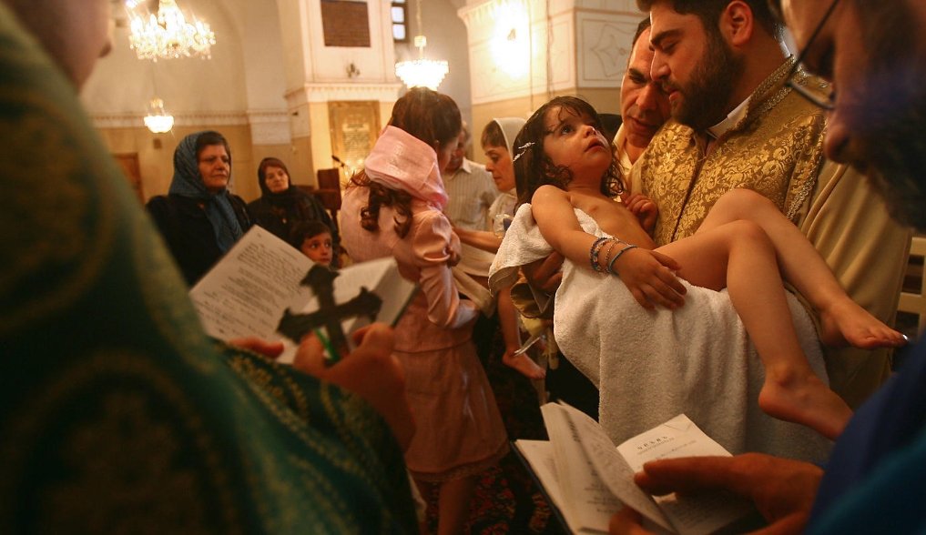 A child is dedicated to Christ in Iran.