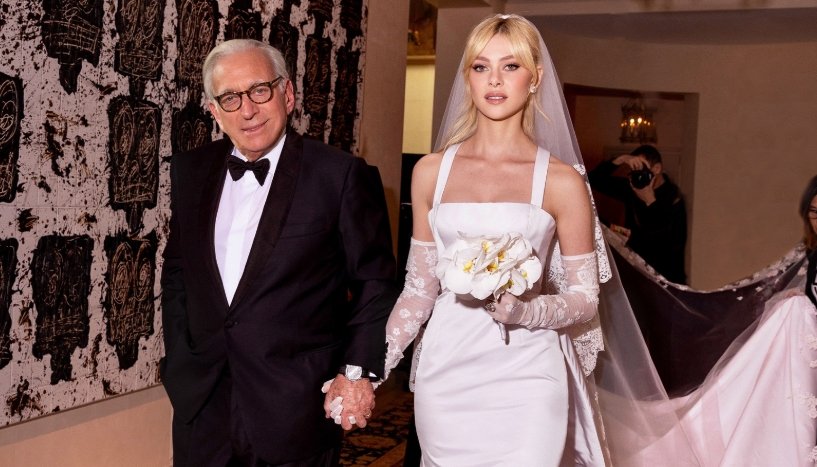 Nicola was walked down the aisle by her father, the billionaire investor Nelson Peltz.