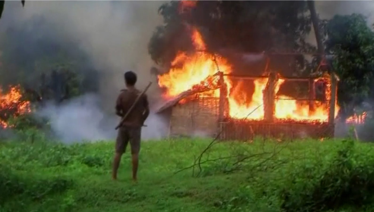 Burning Rohingya villages in Myanmar 2017 crisis.