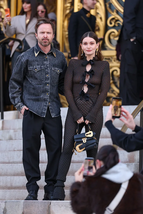 Aaron Paul and Lauren Parsekian attend the Schiaparelli Haute Couture Week Spring/Summer 2026 show as part of Paris Fashion Week on Jan. 26, 2026 in Paris.