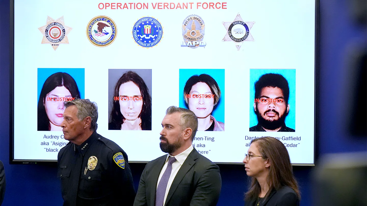 Images of suspects in an alleged terror plot are presented on a screen during a Los Angeles press conference on Dec. 15, 2025.
